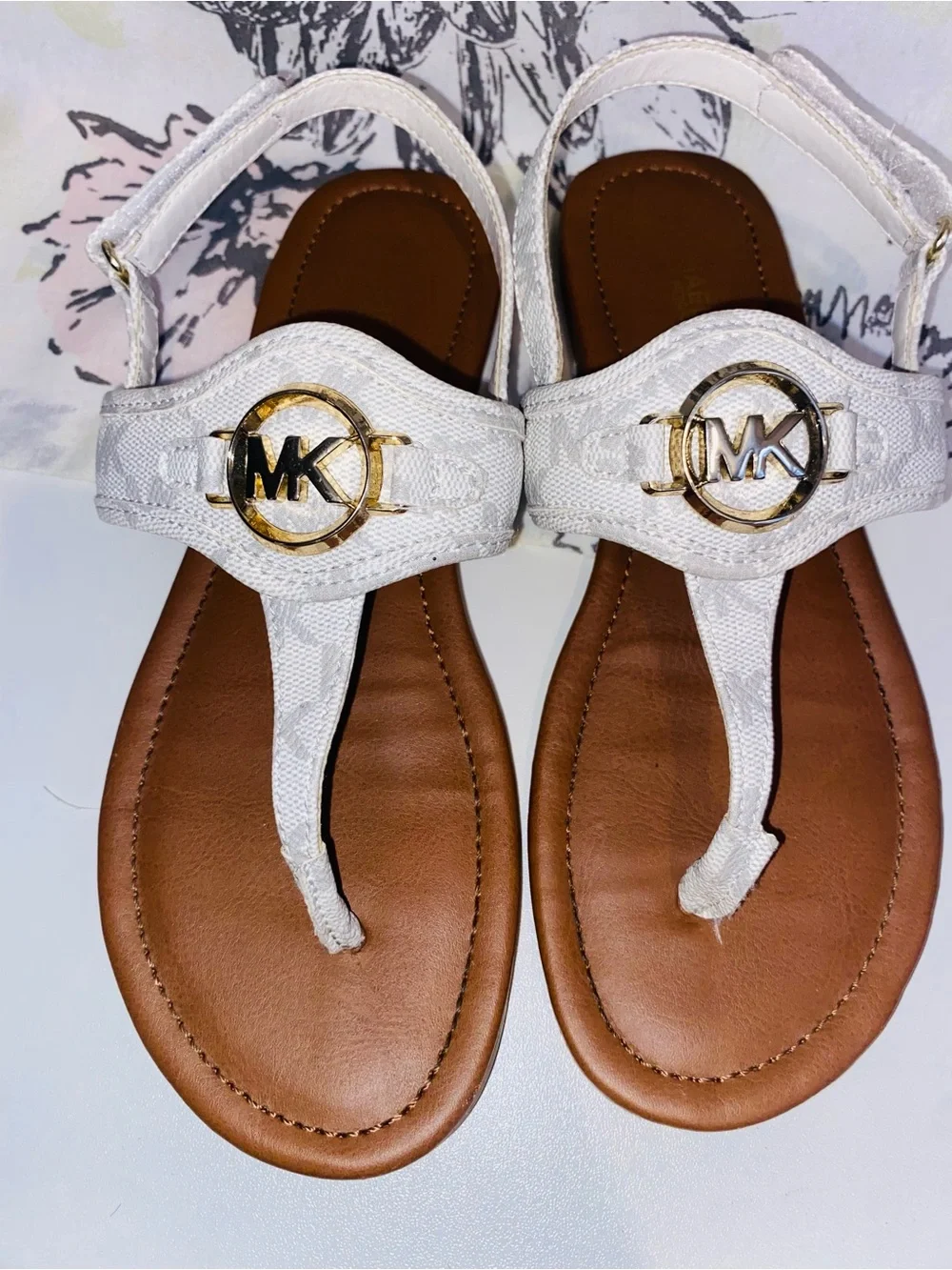 Michael Kors White Logo Thong Sandals with Gold MK Emblems